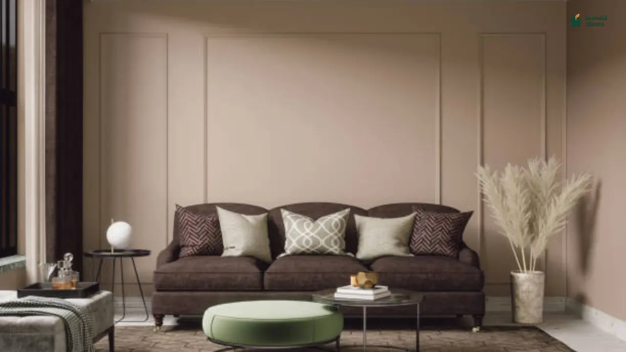 living room with a brown sofa styled with warm neutral decor